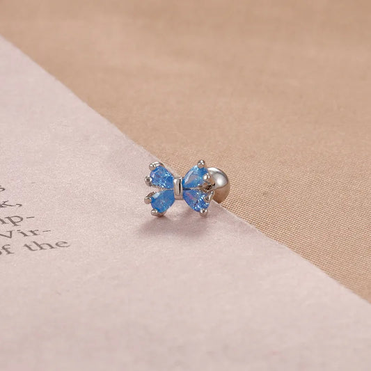 ARETES ORTOPEDICOS LAZON CON ZIRCON AZUL PLATEADO