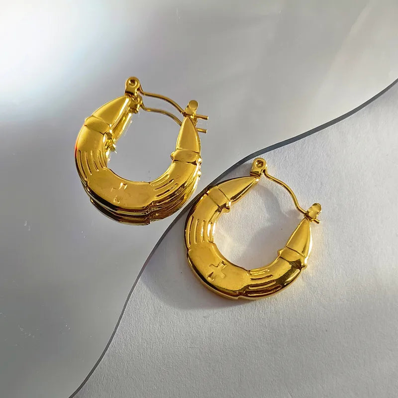 ARETES DE ARGOLLA CON TEXTURA DORADO