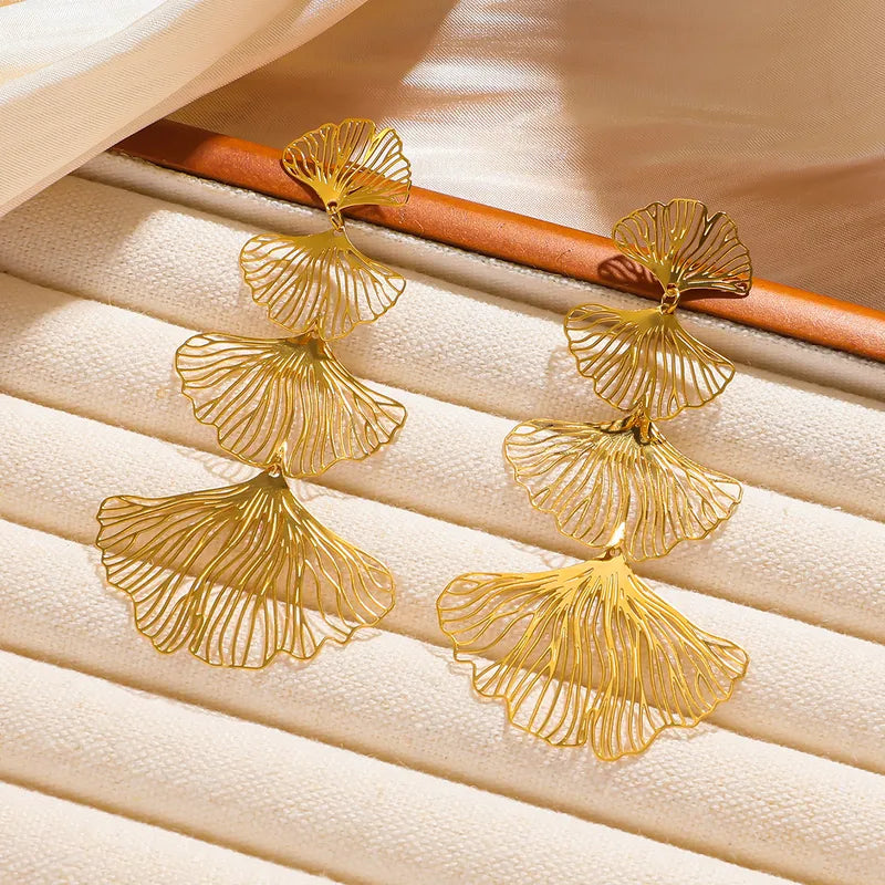 ARETES DE HILERA DE FLOR DORADO