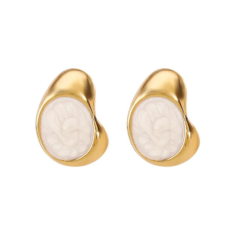 ARETES ALARGADOS NACARADOS BLANCO DORAOD