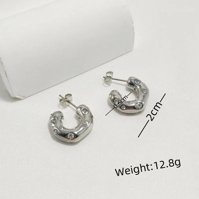 ARGOLLAS CON PERLAS Y ZIRCONES PLATEADO