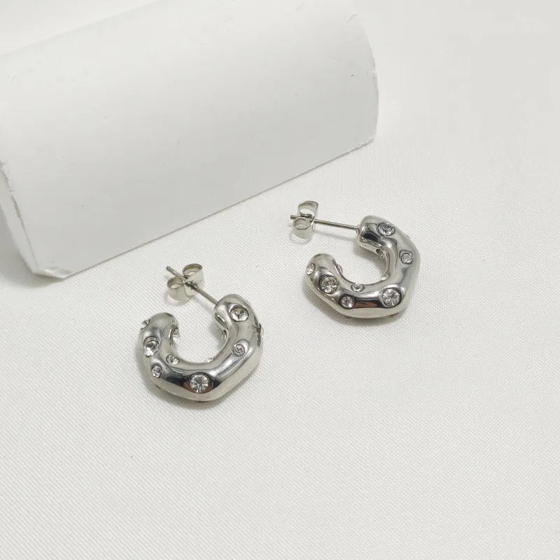 ARGOLLAS CON PERLAS Y ZIRCONES PLATEADO