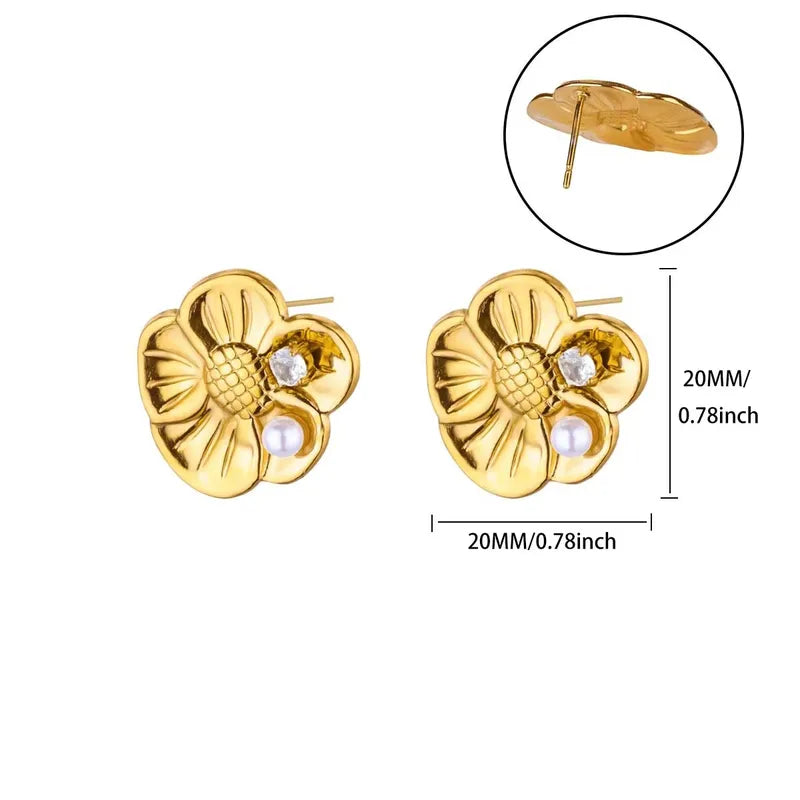 ARETES DE FLOR CON PERLA DORADO