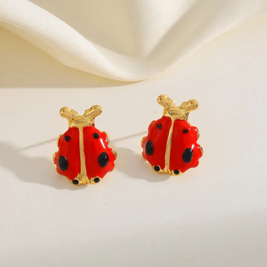 ARETES DE MARIQUITA DORADO