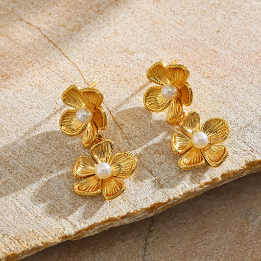 ARETES DOBLES DE FLOR CON PERLA DORADO