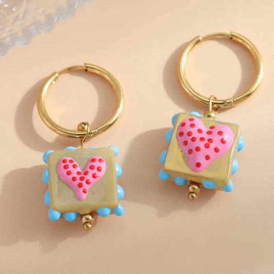 ARETES ARGOLLA DOBLE FUNCION DIJE DE CORAZON