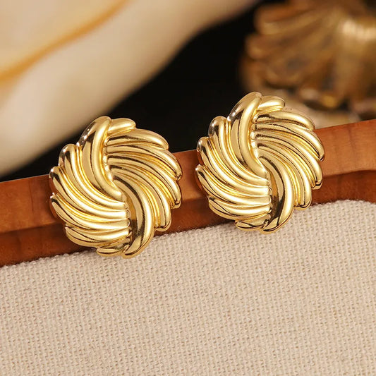 ARETES BOTONES EN ESPIRAL DORADO