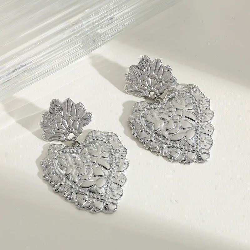 ARETES CORAZONES GRANDES PLATEADOS