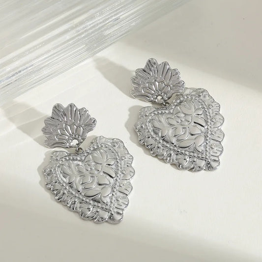 ARETES CORAZONES GRANDES PLATEADOS
