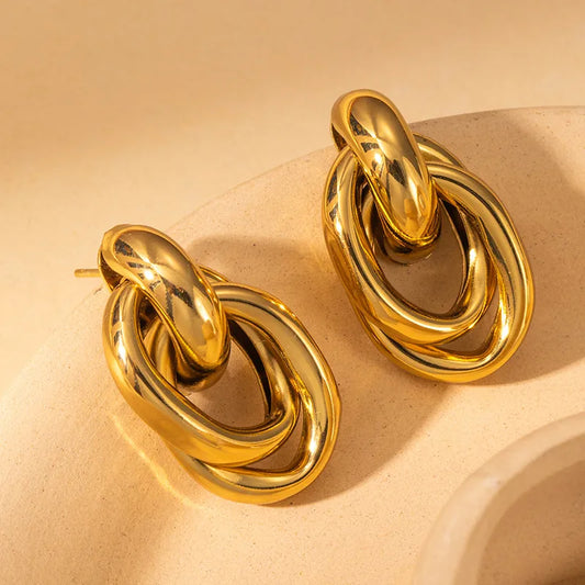 ARETES DOBLE NUDO DORADO