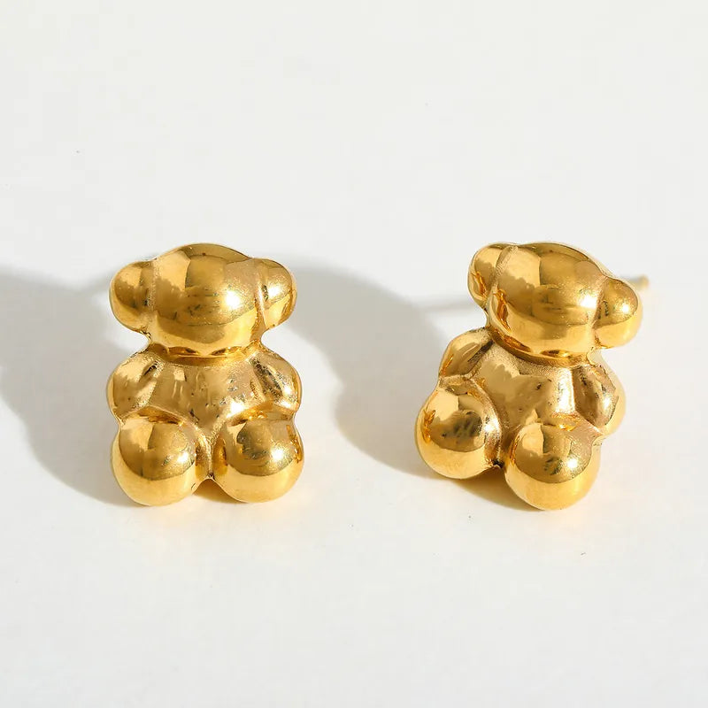 ARETES DE OSITO DORADO