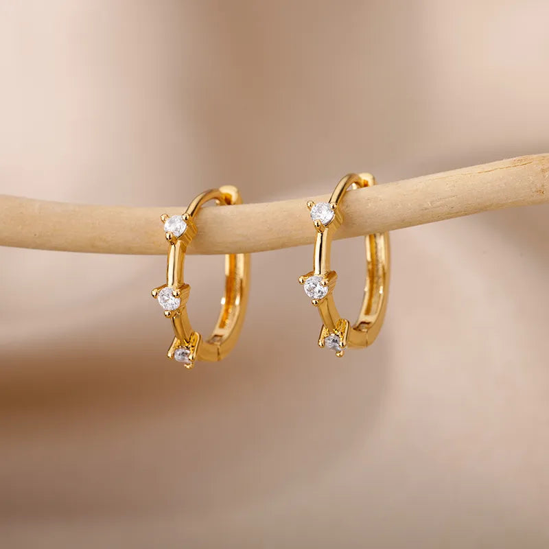 ARETES INTERCALADOS ZIRCONES DORADO