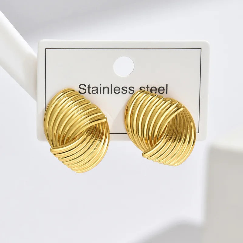 ARETES DOBLE NUDOS LINEAS DORADO