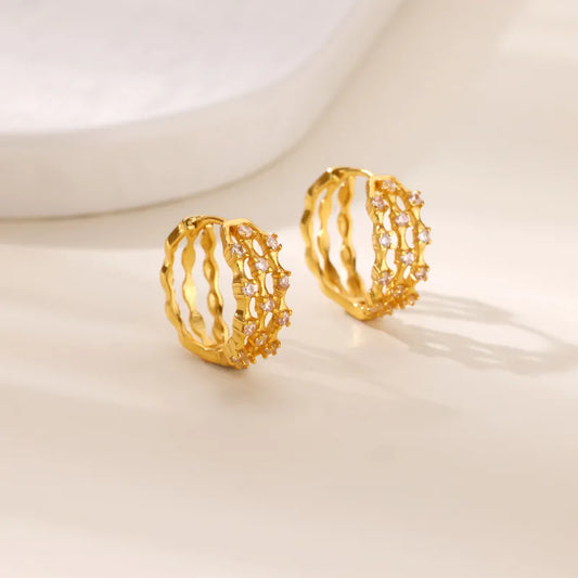 ARETES ARGOLLAS DOBLE FUNCION CON ZIRCONES DORADO