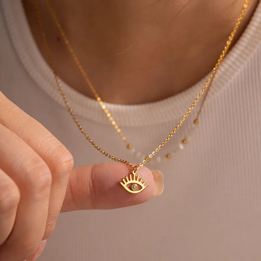 LAYER DOBLE CON PERLAS Y DIJE DE OJO TURCO