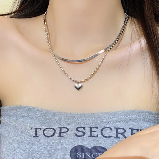 LAYER DOBLE CON DIJE DE CORAZON PLATEADO