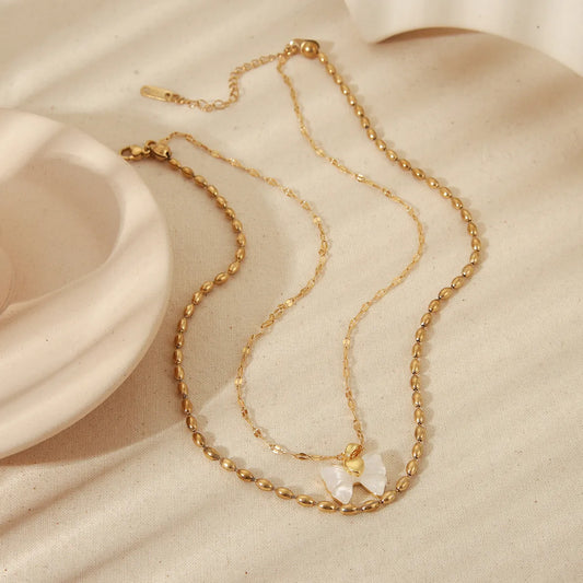 LAYER DOBLE CON DIJE DE MARIPOSA BLANCA