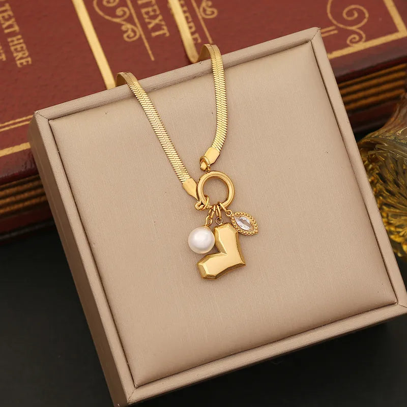 CADENA DIJE DELANTERO CON CORAZON DORADO
