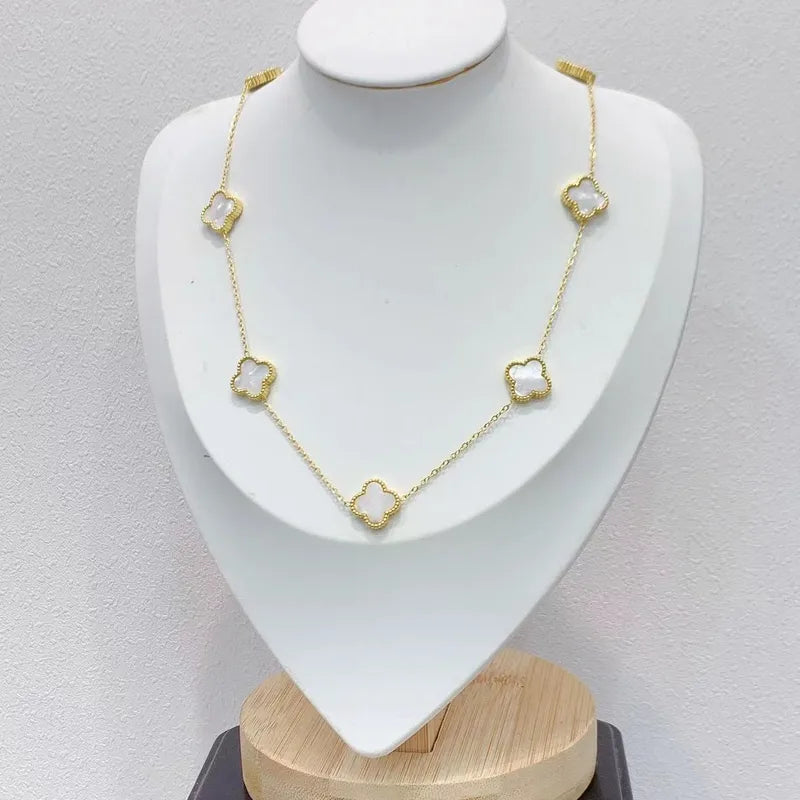 Cadena van cleef dorado-blanco