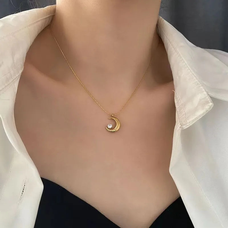 CADENA DE LUNA CON ZIRCON DORADO