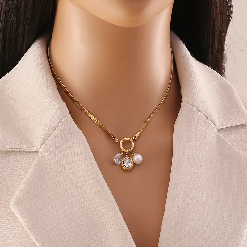 CADENA BROCHE DELANTERO ZIRCON DORADO