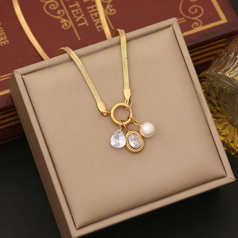 CADENA BROCHE DELANTERO ZIRCON DORADO