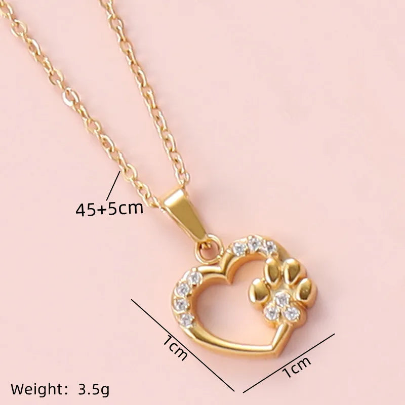 CADENA DE CORAZON CON PATITA DE PERRO DORADO