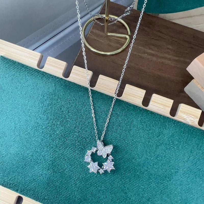 CADENA DE MARIPOSAS EN CIRCULO CON ZIRCONES PLATEADO