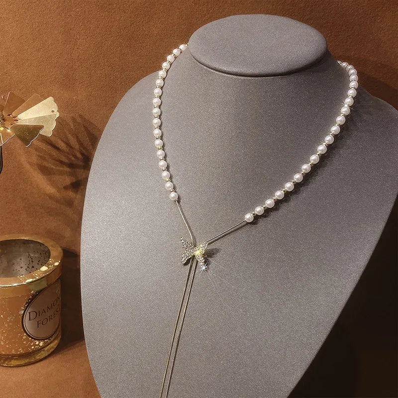 CADENA DE MARIPOSA CON PERLAS LARGA AJUSTABLE DORADO