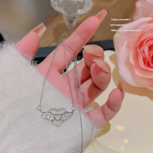 CADENA DIJE CORAZON CON ALAS