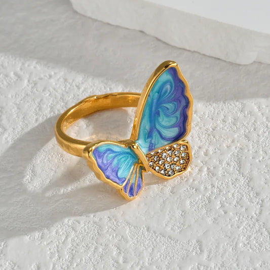 ANILLO AZUL CON MORADO MARIPOSA DORADO