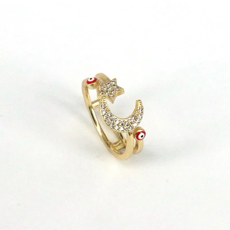 Anillo ojo turco con luna y estrellas rojo