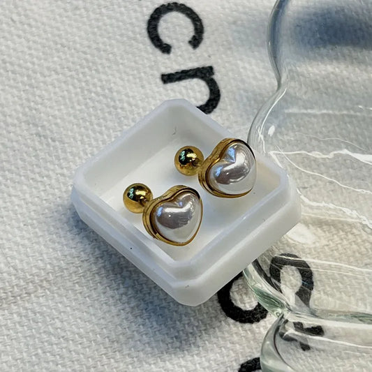 ARETES ORTOPEDICOS DE CORAZON CON PERLA DORADO